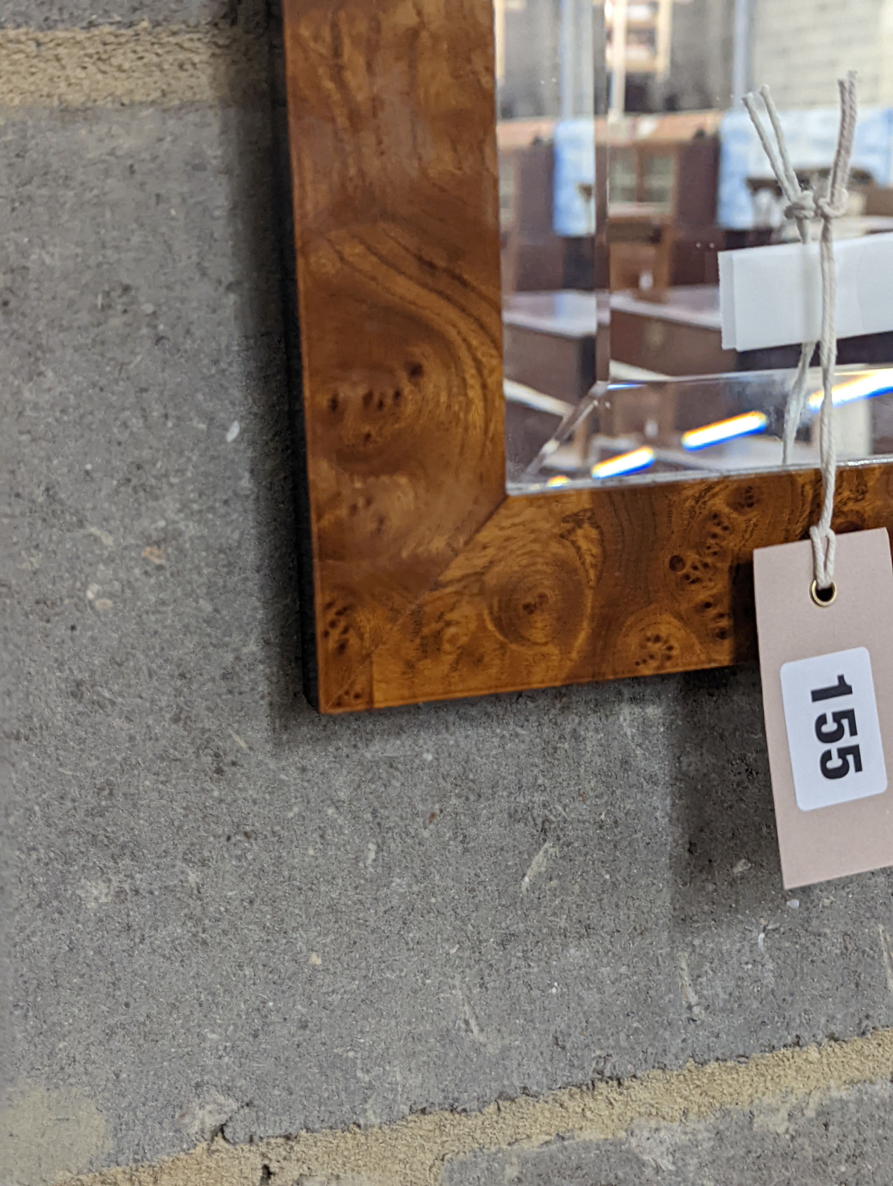 A modern rectangular wall mirror in burr walnut frame, width 50cm, height 73cm